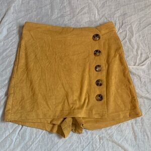 Yellow, faux leather, zip up mini skort.